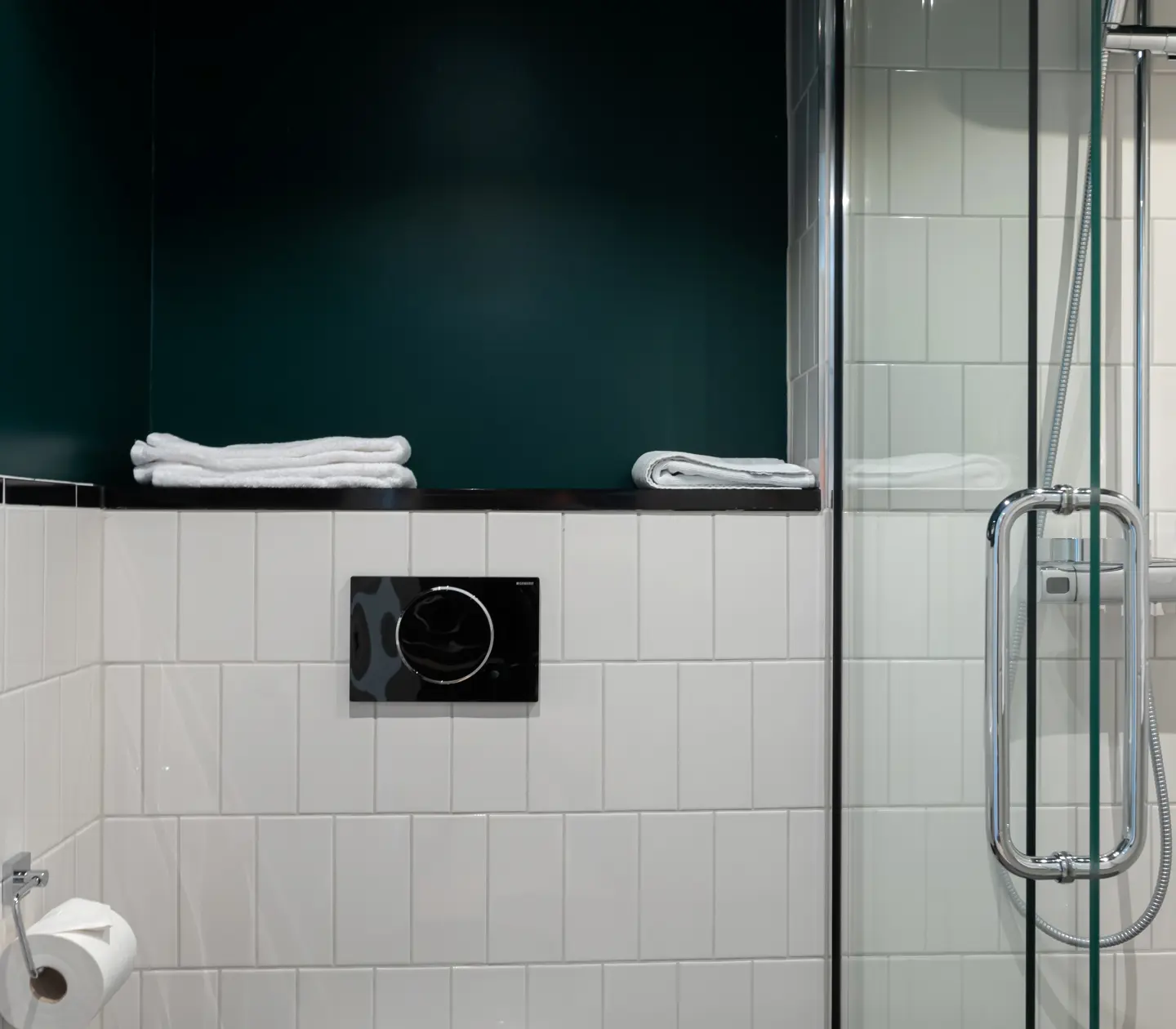 Bathroom with shower and towels